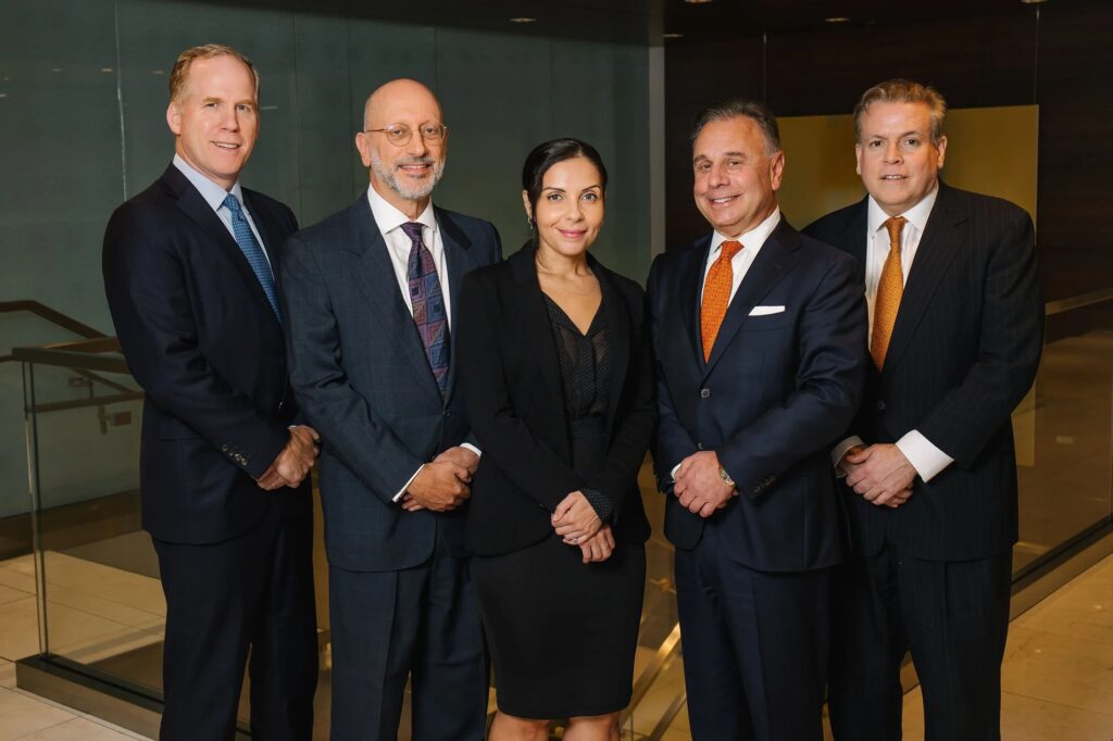 Percival Consulting Group's leadership team posing for a photo